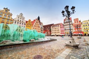 Wroclaw, Poland. The market square with the famous fountain and colorful historical buildings. Silesia region.